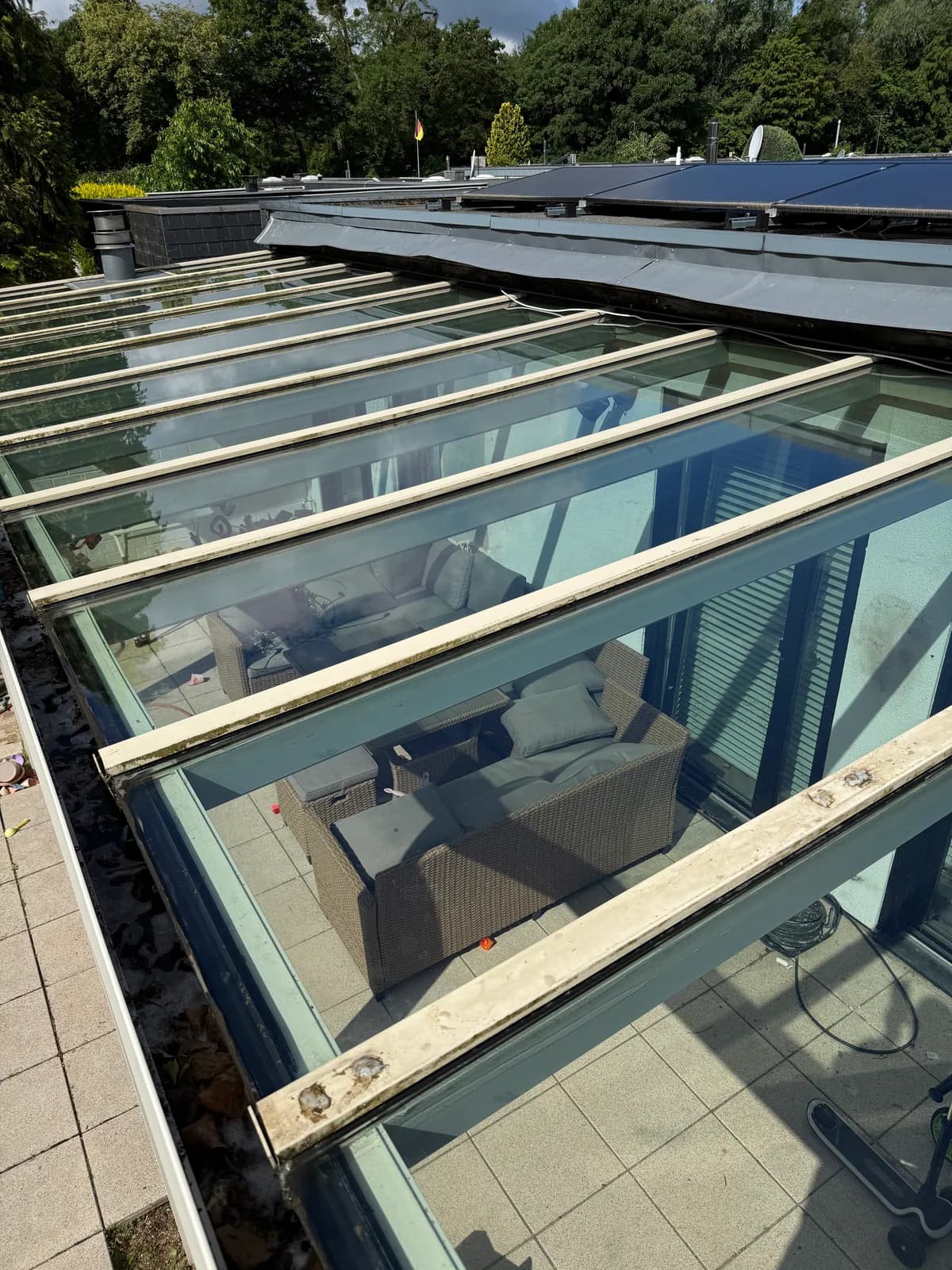 A glass roof over a patio